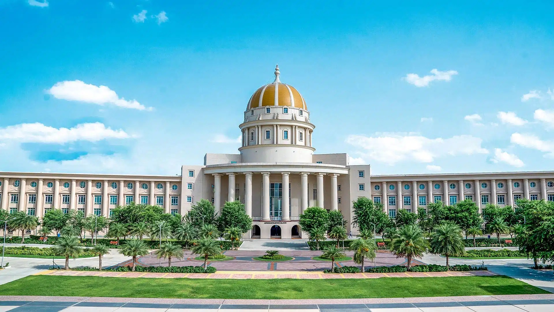 Manipal University Jaipur administrative building with its golden dome and landscaped gardens